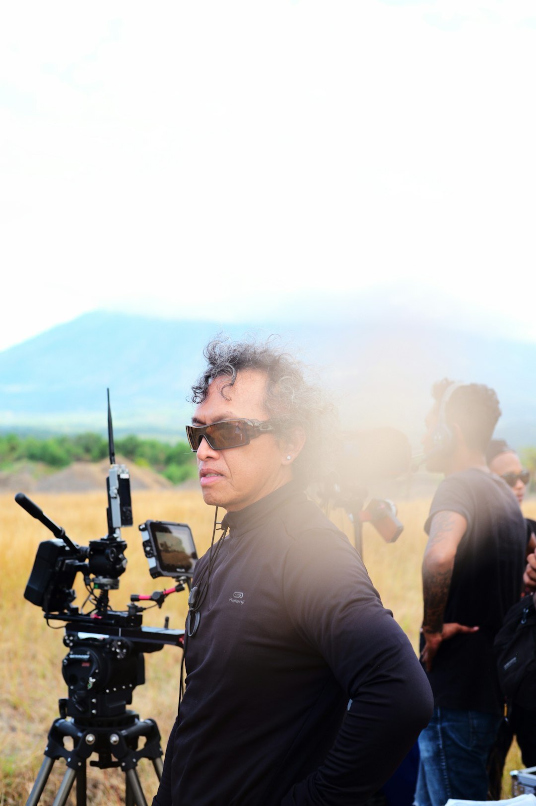 Journalist taking notes in the field during a live report