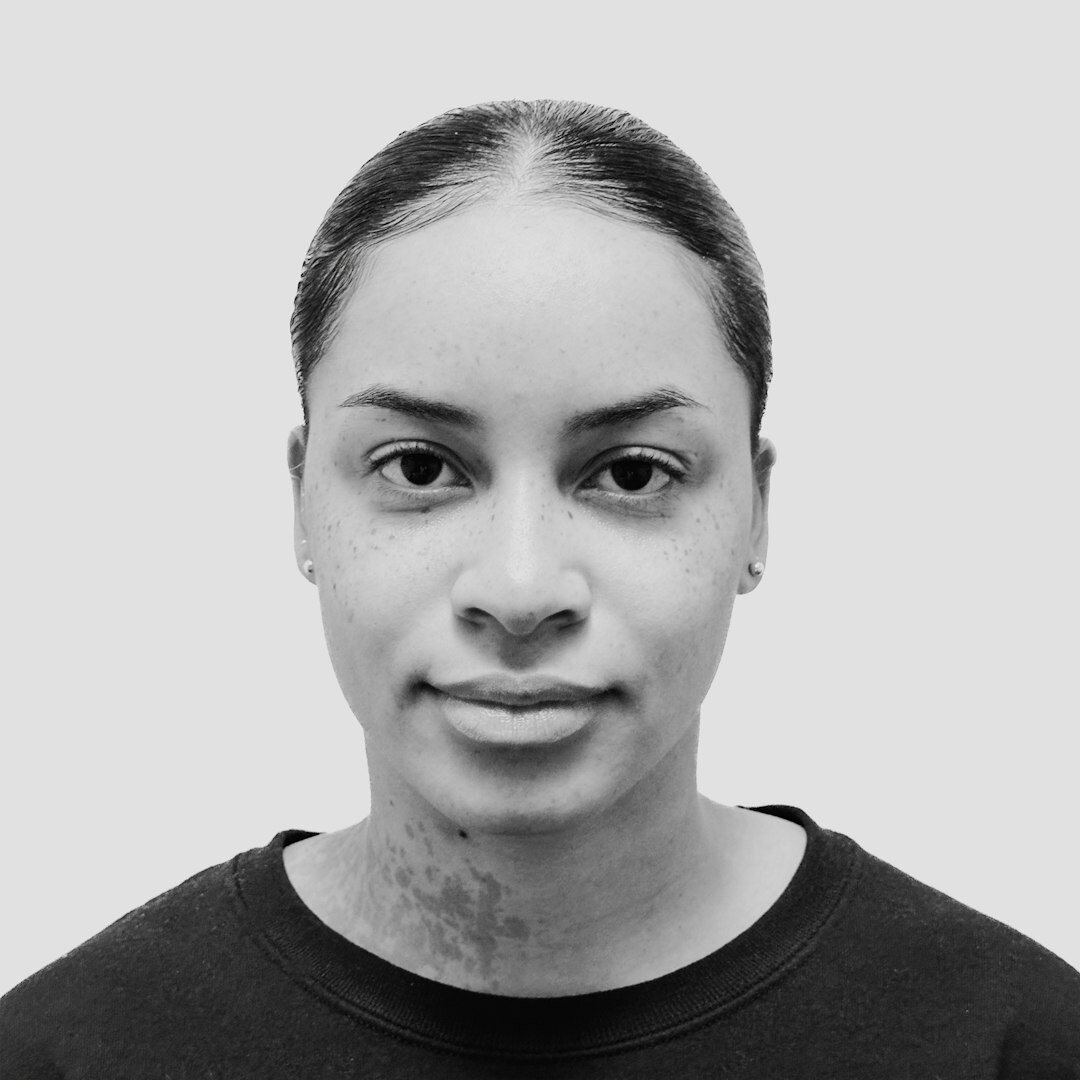 Portrait of a woman of African descent in her 30s, head of field reporting